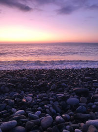 Scenic view of sea during sunset