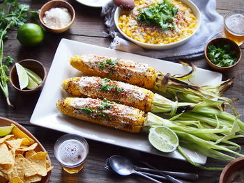 High angle view of fruits in plate on table