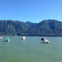 Boats sailing in sea