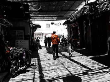 Full length of woman walking in city