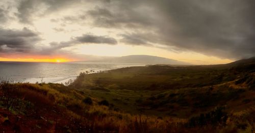 Scenic view of sea at sunset