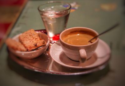 Close-up of coffee cup on table