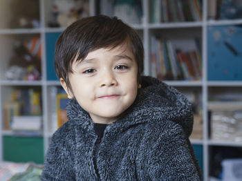 Portrait of cute boy at home