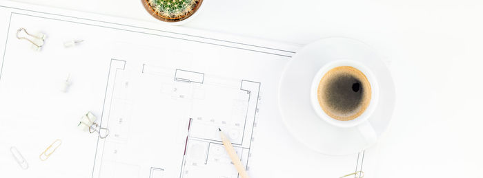 High angle view of coffee cup on table