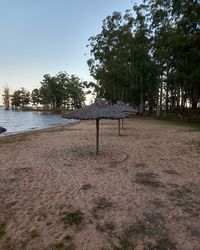 Scenic view of beach against clear sky