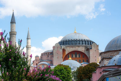 View of cathedral and buildings against sky