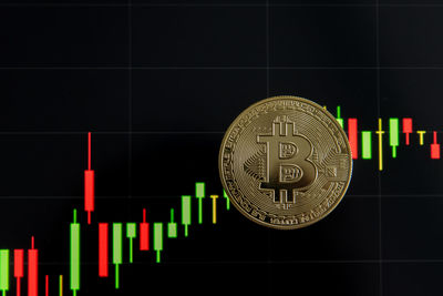 Digital composite image of illuminated lighting equipment against black background