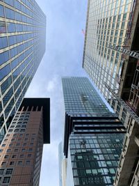 Low angle view of modern buildings against sky