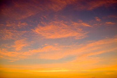 Low angle view of cloudy sky during sunset