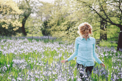 Woman standing on field