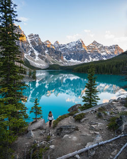 Walking into perfect sunset at moraine lake at lake louise banff