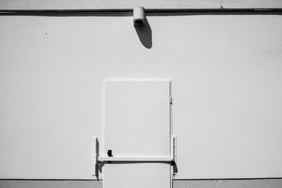 Lighting equipment and closed door on wall