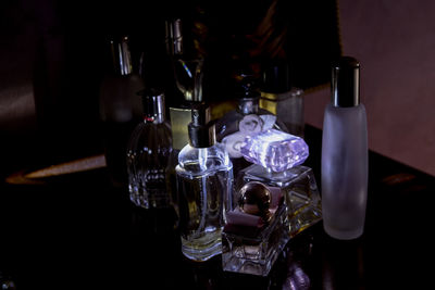 Close-up of wine bottles on table