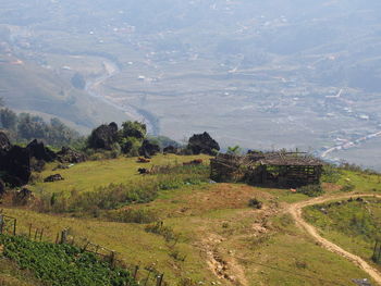 High angle view of field against mountains