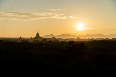 Scenic view of pagoda in bagan during sunrise
