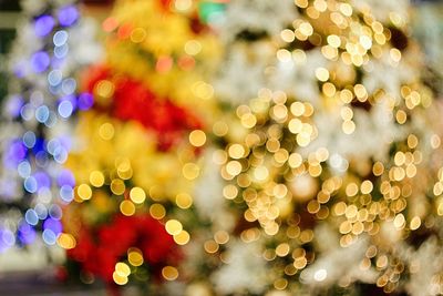 Defocused image of illuminated christmas tree