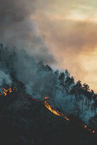 Panoramic view of bonfire on mountain