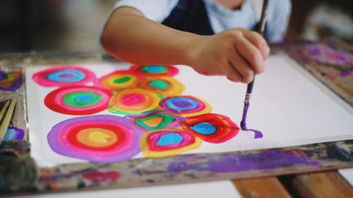 Close-up of girl making drawing