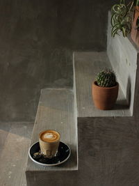 High angle view of coffee cup on table