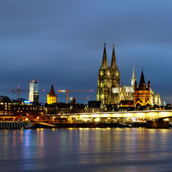 Illuminated buildings at waterfront