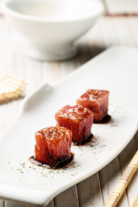 High angle view of meat in plate on table