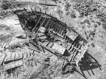 High angle view of broken glass on land