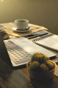 High angle view of coffee cup on table