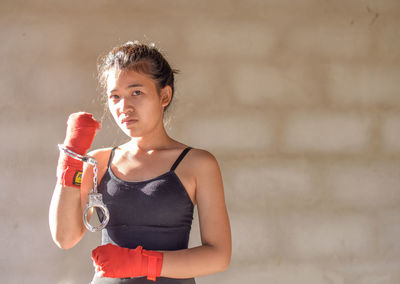 Portrait of young female boxer