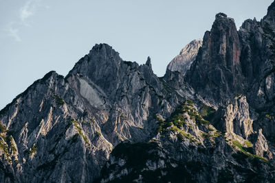 Scenic view of snow covered mountains against sky