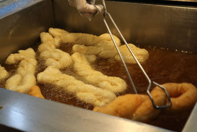 Midsection of person preparing food