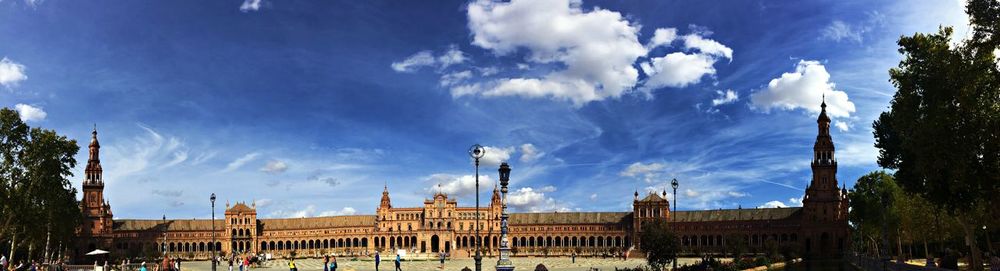 Low angle view of buildings against blue sky