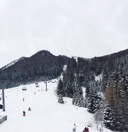 Scenic view of snow covered mountain against sky