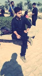 Full length of couple kissing outdoors