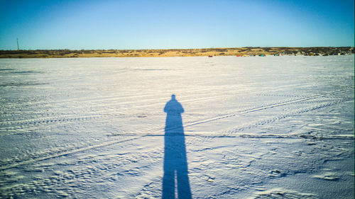 Scenic view of landscape against clear blue sky