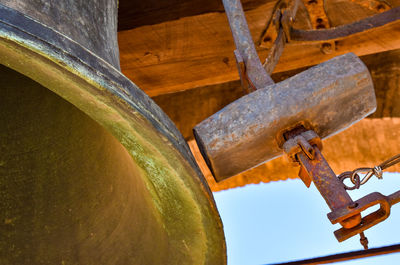 Low angle view of rusty machinery