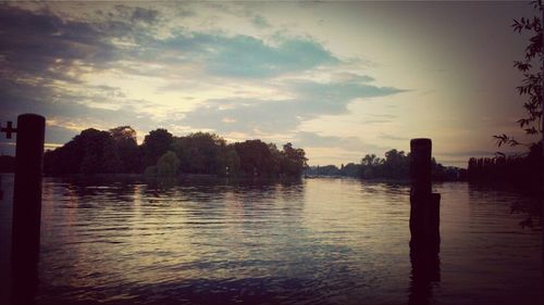 Scenic view of lake at sunset