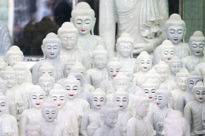 View of statues at market stall