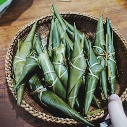 Rice mixed with beans wrapped in leaves