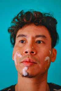 Close-up portrait of young man