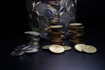 Stack of coins on table