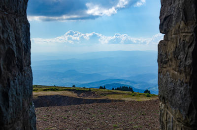 Picturesque landscape of mountains and hills in summer, framed by stone walls - kopaonik, serbia