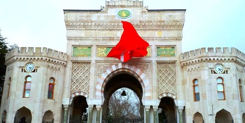 Low angle view of flag against sky