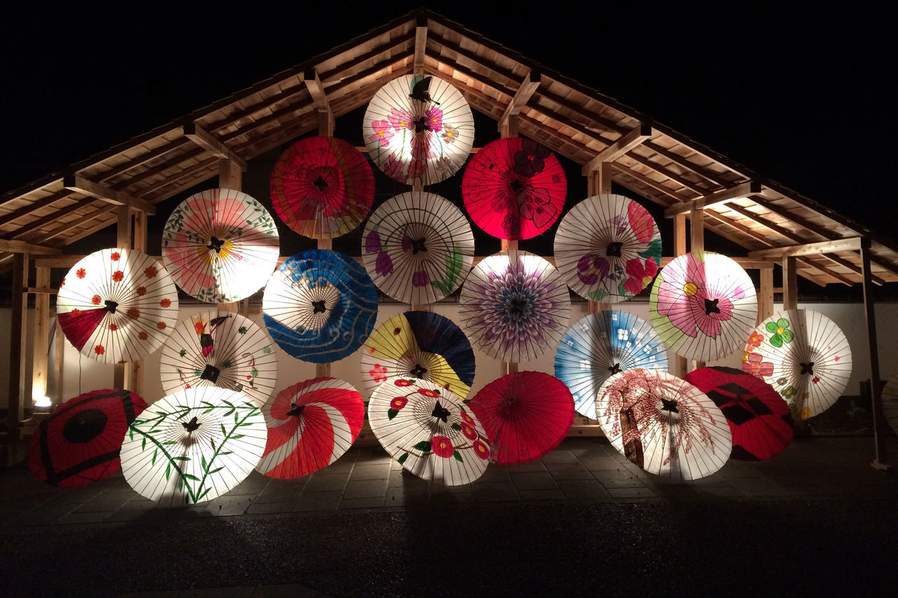 decoration, indoors, flower, multi colored, red, night, illuminated, hanging, celebration, tradition, built structure, art and craft, variation, lantern, no people, architecture, table, art, colorful, cultures