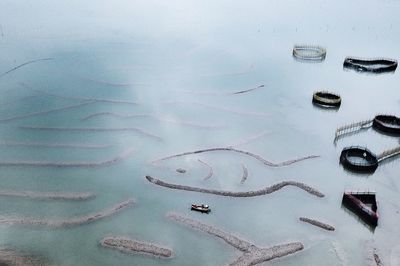 Aerial view of boat moored on lake