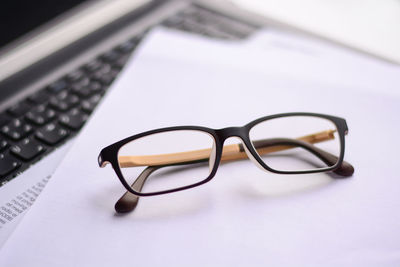 Close-up of eyeglasses on table