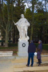 Rear view of statue in park