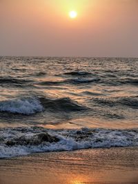 Scenic view of sea at sunset