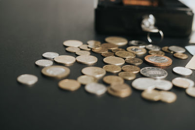 High angle view of coins on table