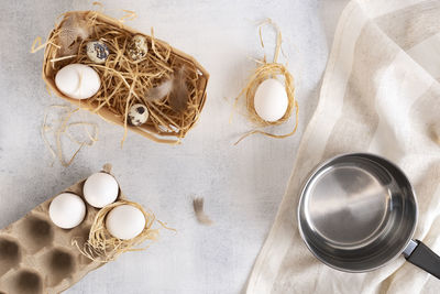 Step by step painting easter eggs. step 1 boil white eggs. natural coloring easter eggs in blue