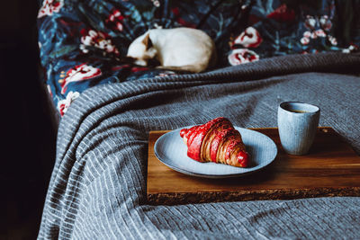 High angle view of breakfast on bed